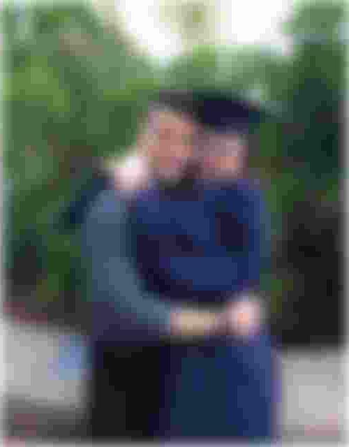 Caitlyn and her boyfriend, 克里斯, at her graduation from the University of Connecticut in 2019.